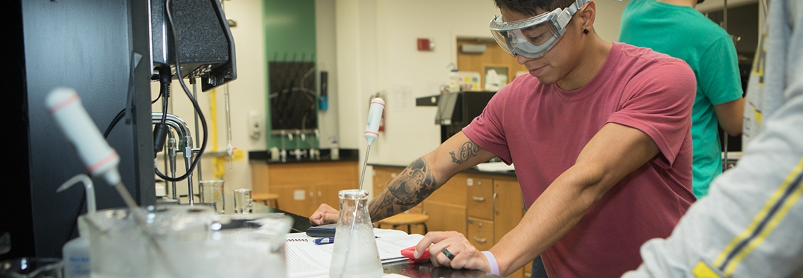 A student working in a chemistry lab.